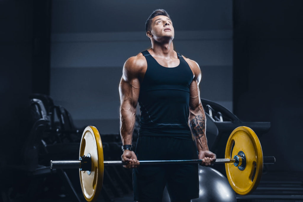 sport-muscular-fitness-man-working-out-at-the-gym